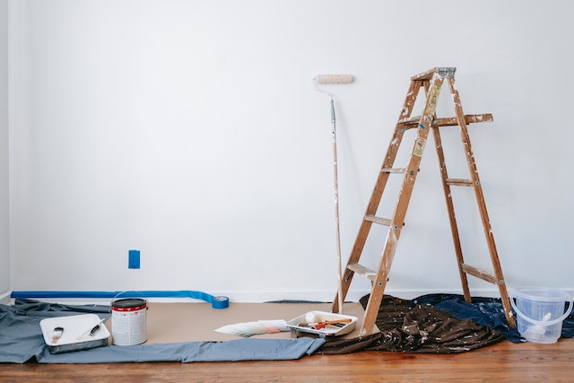 painting supplies in front of wall